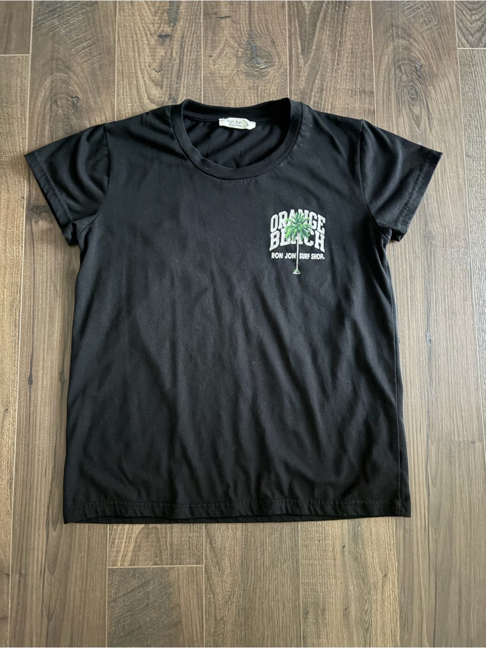 Ron Jon Black Tee with Green Palm 'Orange Beach' Logo